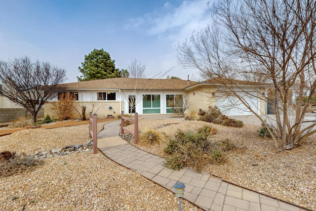 ranch-style house with brick siding