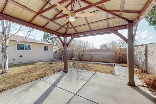 view of patio featuring a gazebo and a fenced backyard