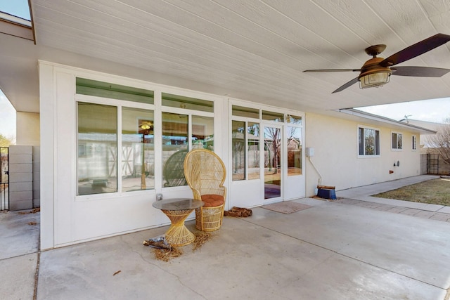 view of patio featuring a ceiling fan