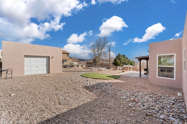 view of yard with a patio area and fence