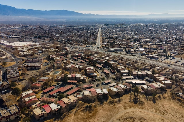 drone / aerial view featuring a mountain view and a residential view