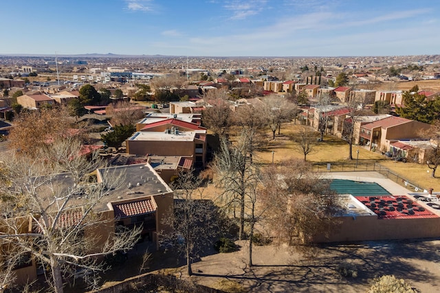 birds eye view of property with a residential view