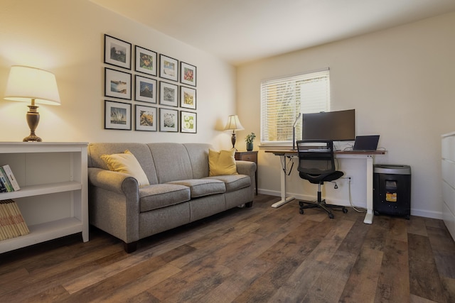 home office featuring baseboards and wood finished floors