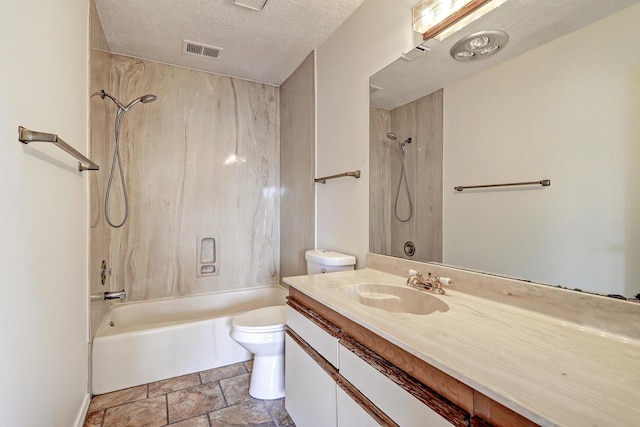 bathroom with visible vents, shower / washtub combination, toilet, vanity, and a textured ceiling