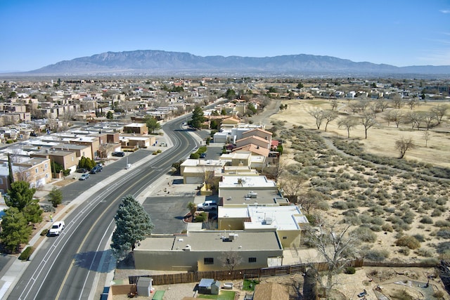 drone / aerial view featuring a mountain view