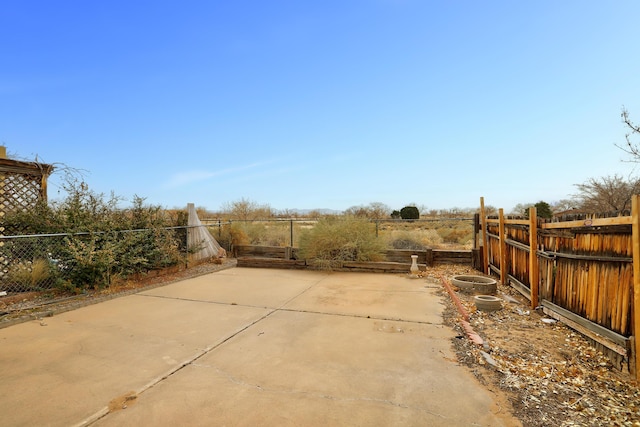 view of patio with fence