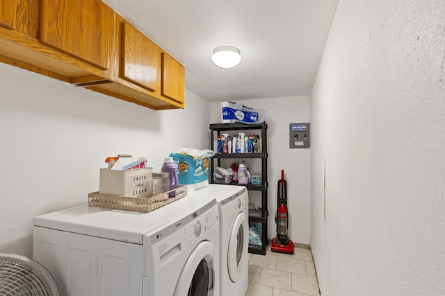 laundry room with cabinet space and washer and dryer