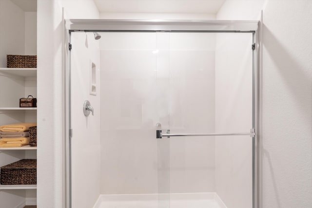 bathroom featuring a stall shower