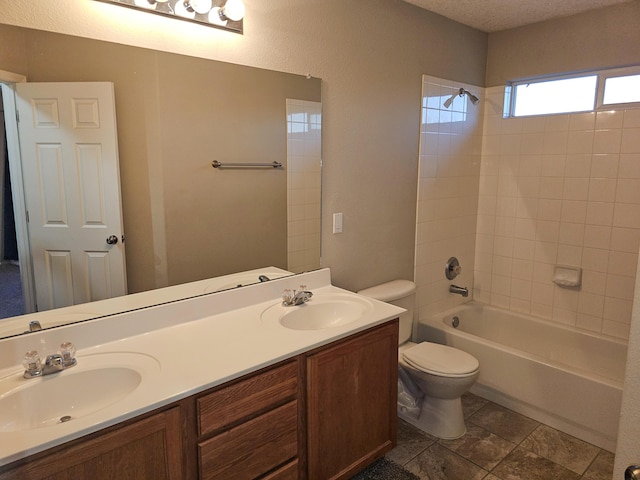 6619 Country Hills Ct NW, Albuquerque, NM 87114 - bathroom featuring a sink, toilet, double vanity, and a textured ceiling