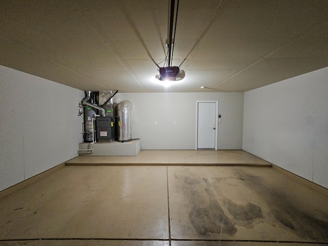 6619 Country Hills Ct NW, Albuquerque, NM 87114 - garage featuring heating unit and a garage door opener