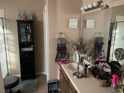 bathroom with vanity and tile patterned flooring