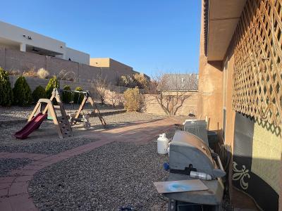 view of yard with playground community and fence