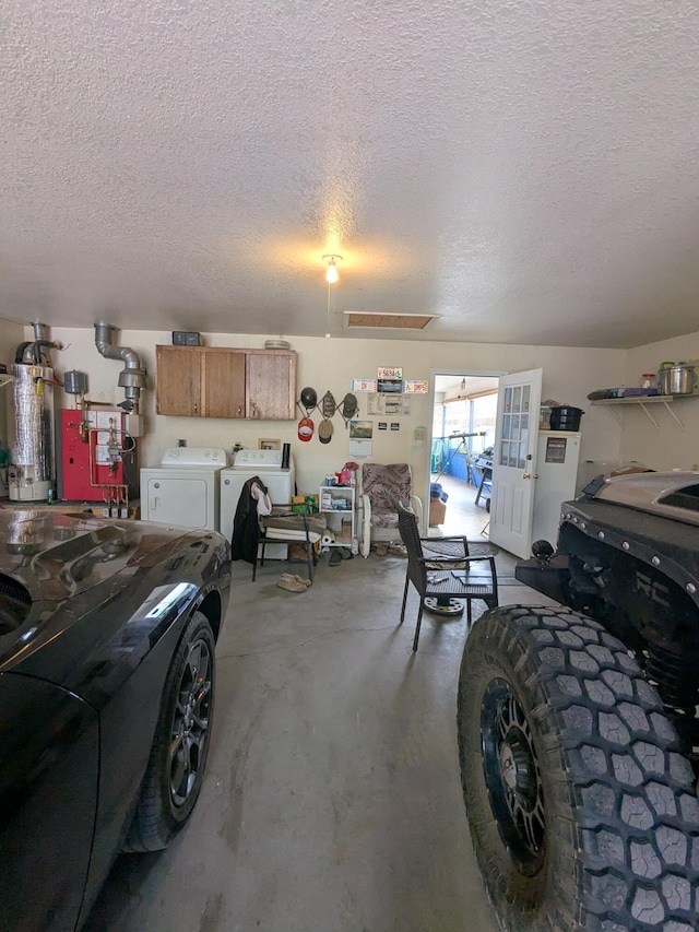 garage with washer and dryer