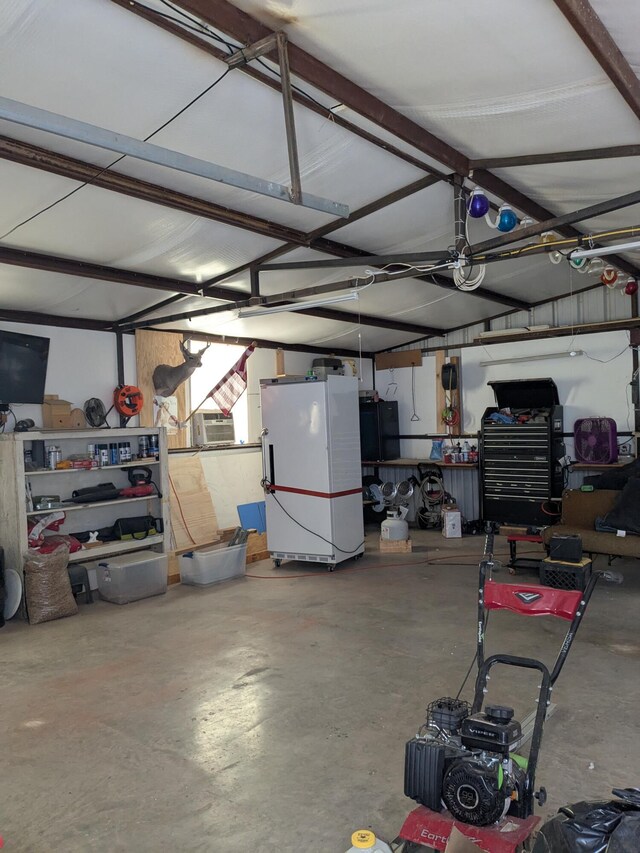 garage featuring freestanding refrigerator