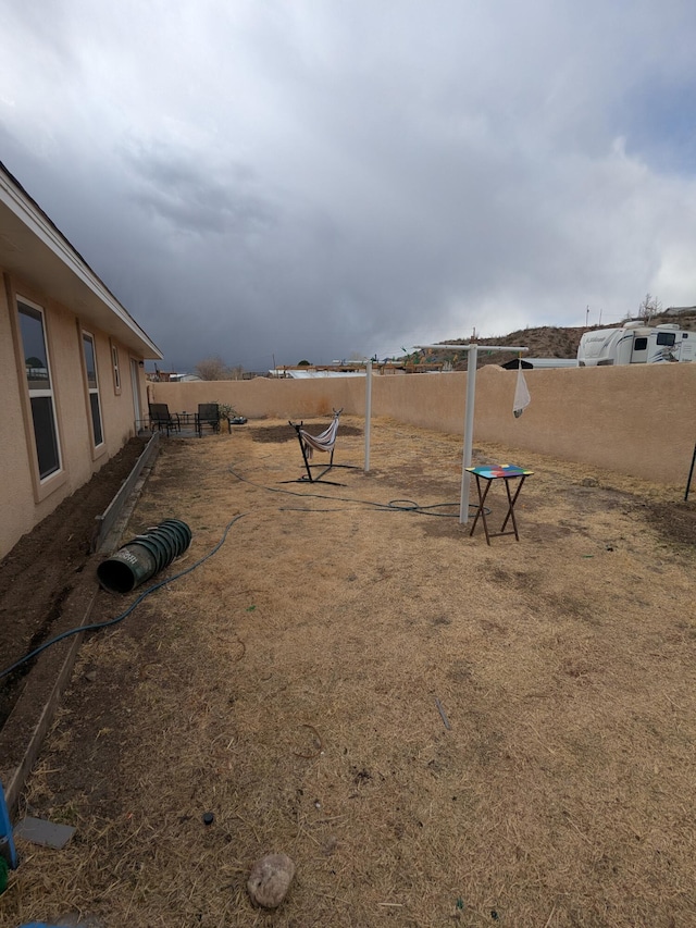 view of yard featuring fence