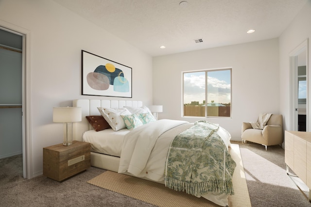 carpeted bedroom featuring recessed lighting and visible vents