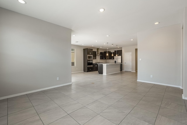 2158 Janet Way, Rio Rancho, NM 87144 - unfurnished living room featuring recessed lighting and light tile patterned floors