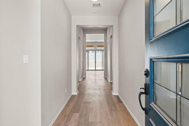 8401 Twain Way NW, Albuquerque, NM 87114 - hallway with light wood finished floors and baseboards