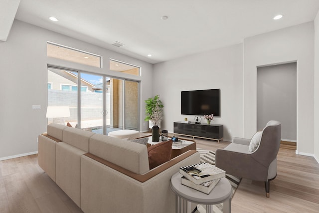 8401 Twain Way NW, Albuquerque, NM 87114 - living area with light wood-type flooring, baseboards, and recessed lighting