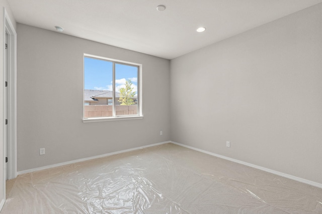 8401 Twain Way NW, Albuquerque, NM 87114 - empty room featuring light colored carpet, recessed lighting, and baseboards