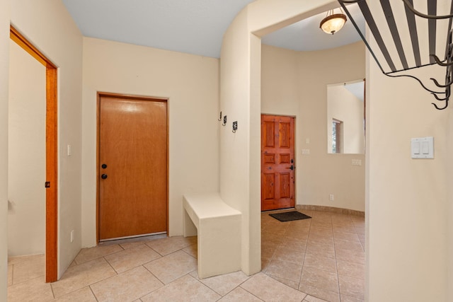 interior space with light tile patterned floors