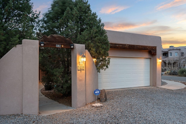 garage featuring driveway