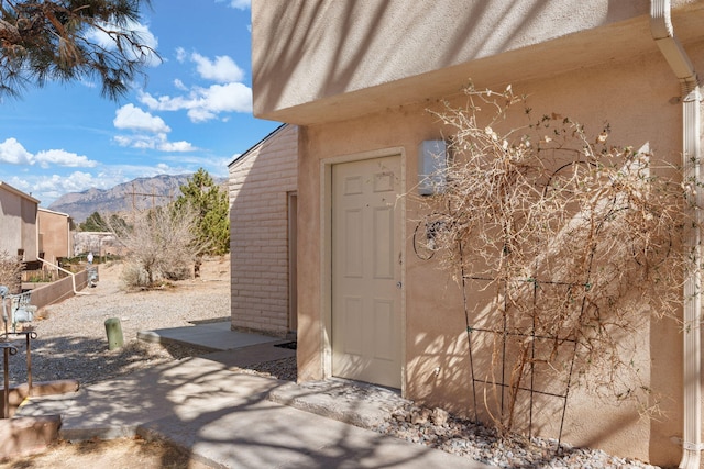 view of outbuilding featuring a mountain view