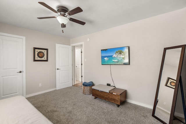 bedroom with baseboards, carpet floors, and ceiling fan