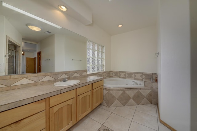 bathroom featuring vanity, a garden tub, visible vents, recessed lighting, and tile patterned floors