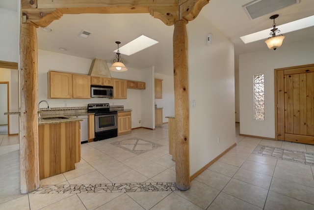 kitchen with visible vents, appliances with stainless steel finishes, a skylight, and light tile patterned flooring