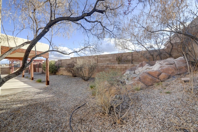 view of yard featuring a fenced backyard