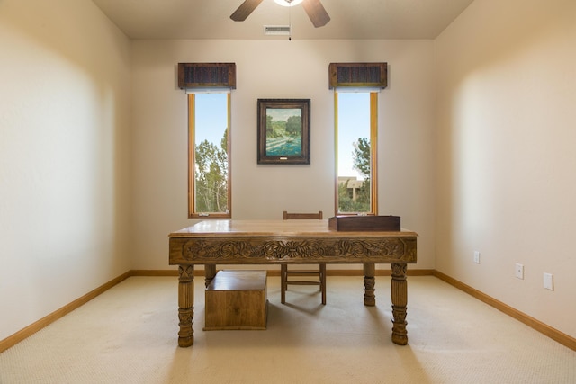 office area with a wealth of natural light, visible vents, and carpet