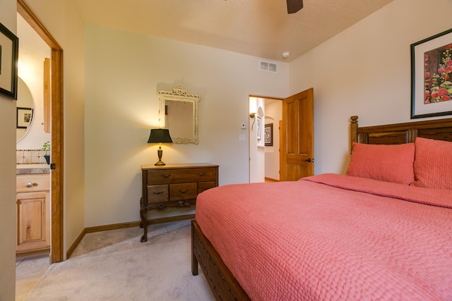 bedroom with visible vents, light colored carpet, a ceiling fan, and baseboards