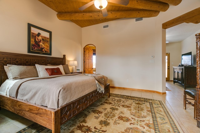 tiled bedroom featuring baseboards, visible vents, arched walkways, and wood ceiling