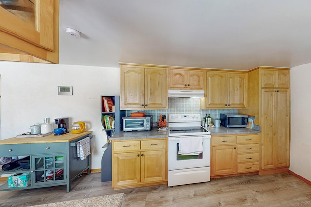 kitchen featuring white electric range oven, stainless steel microwave, light brown cabinets, and under cabinet range hood