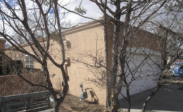 exterior space with stucco siding