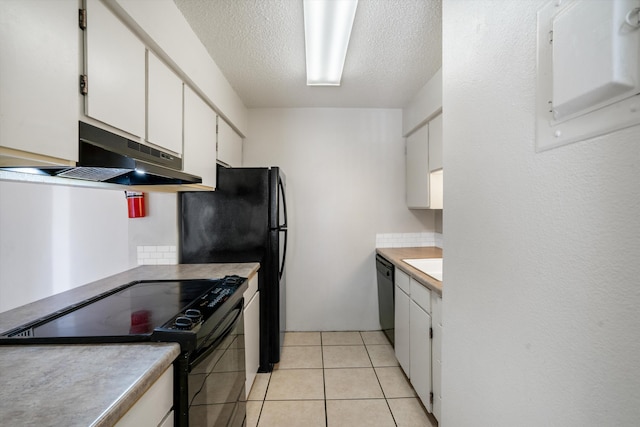 kitchen with light tile patterned floors, black appliances, white cabinets, under cabinet range hood, and a textured ceiling