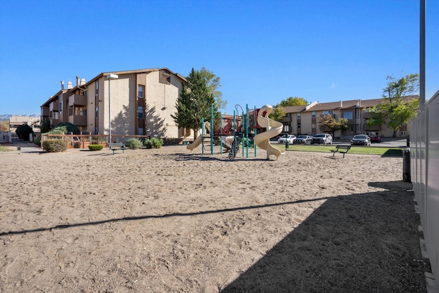 community play area featuring a residential view