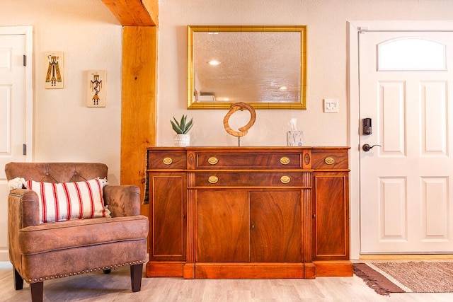 foyer entrance with light wood-style flooring