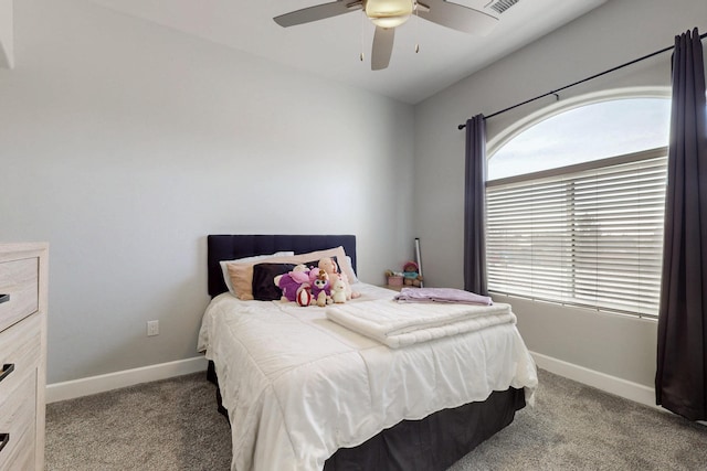 bedroom with visible vents, baseboards, carpet floors, and ceiling fan