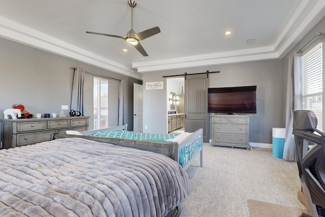 bedroom featuring visible vents, baseboards, a barn door, light carpet, and recessed lighting