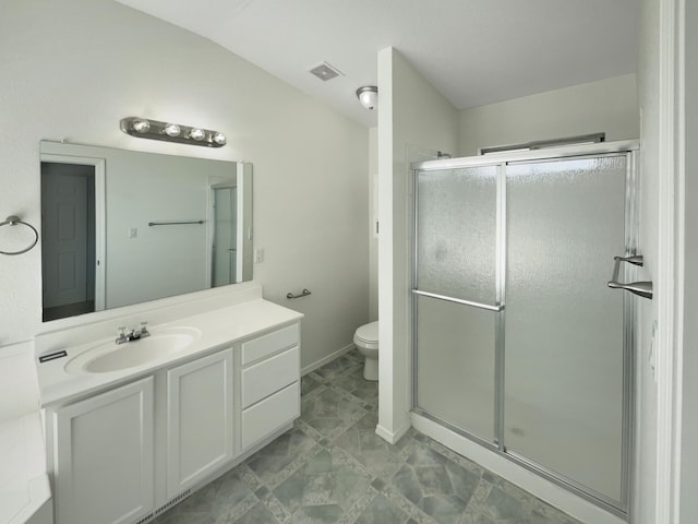 full bathroom featuring visible vents, a shower stall, toilet, vaulted ceiling, and vanity