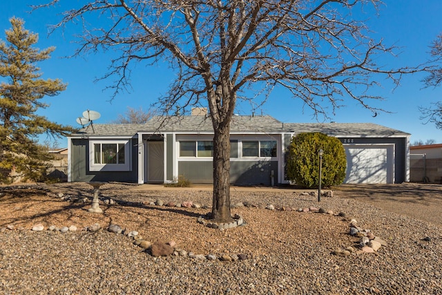 ranch-style house featuring an attached garage