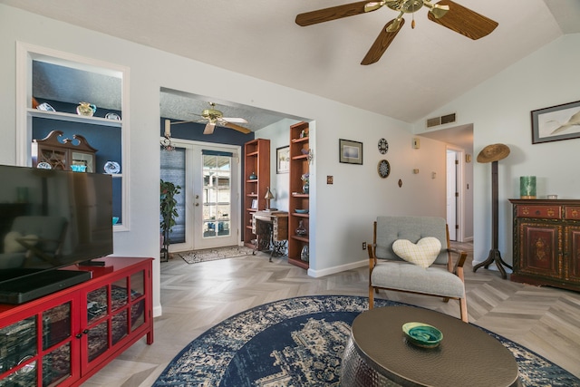 living room featuring lofted ceiling, baseboards, and visible vents