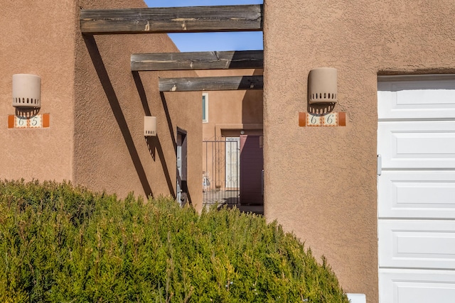 view of side of property with stucco siding