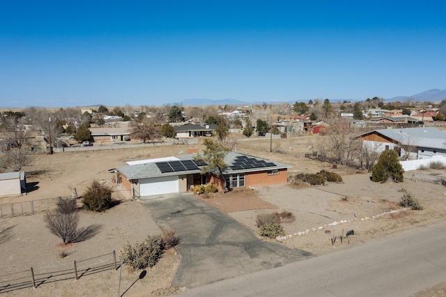 single story home featuring a mountain view