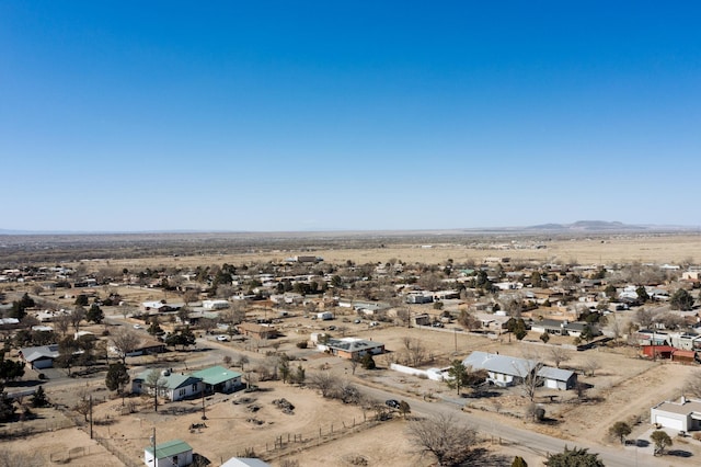 bird's eye view featuring a mountain view and a desert view