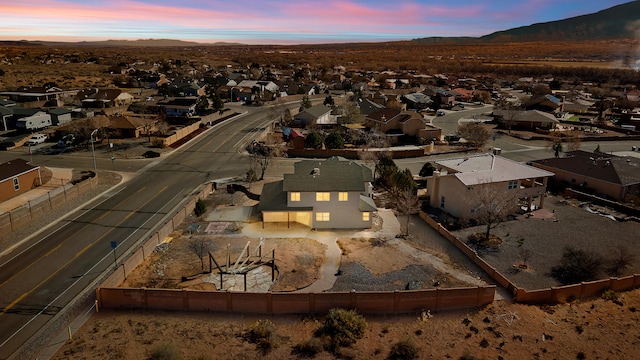 drone / aerial view with a mountain view and a residential view