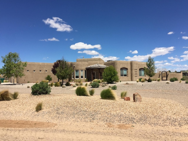 view of adobe home