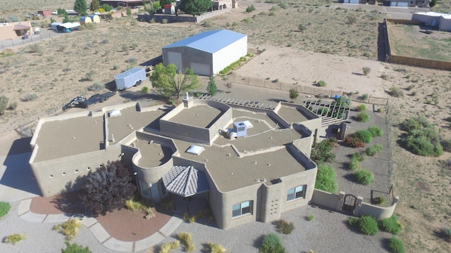 761 Marble Sky Ave NE, Rio Rancho, NM 87144 - aerial overview of property's location featuring a desert landscape and nearby suburban area